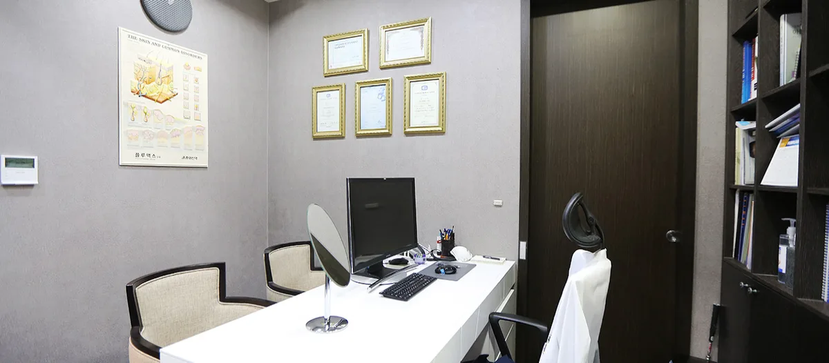 Front reception desk with ToYou logo at Suwon clinic