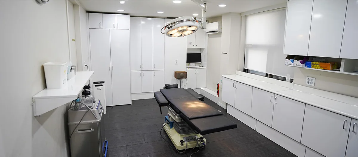 Skin treatment room with beds and devices at ToYou Suwon
